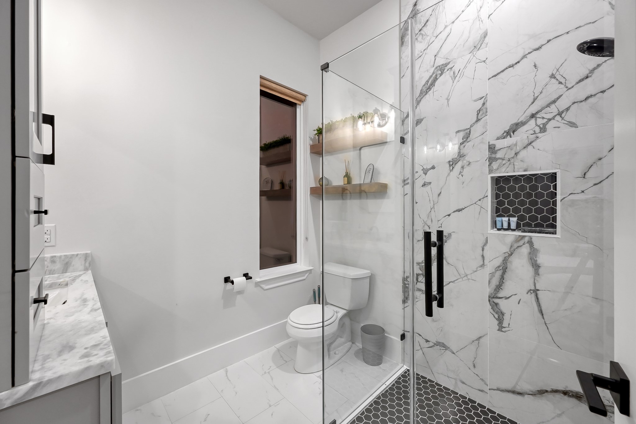 15937 Stagecoach Road Stagecoach, TX 77355 - Photo 47 of 50 a bathroom with a toilet sink and shower