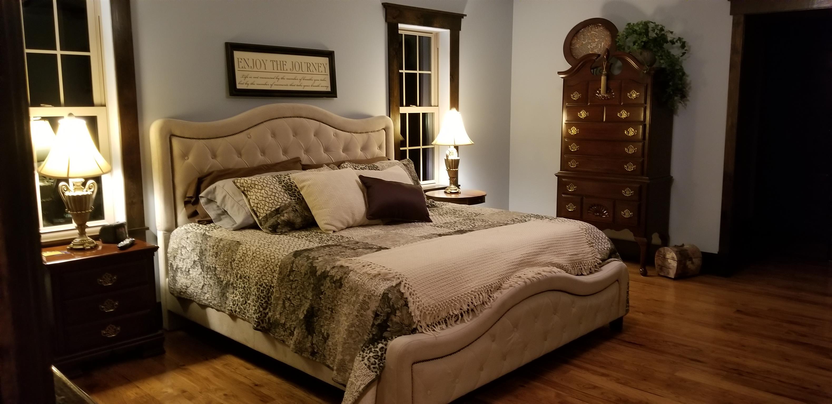 2032 Smalling Road Lafayette, TN 37083 - Photo 13 of 30 Extra large bedroom with gorgeous hardwood flooring.