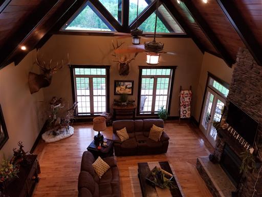 2032 Smalling Road Lafayette, TN 37083 - Photo 7 of 30 View of den from upstairs balcony.