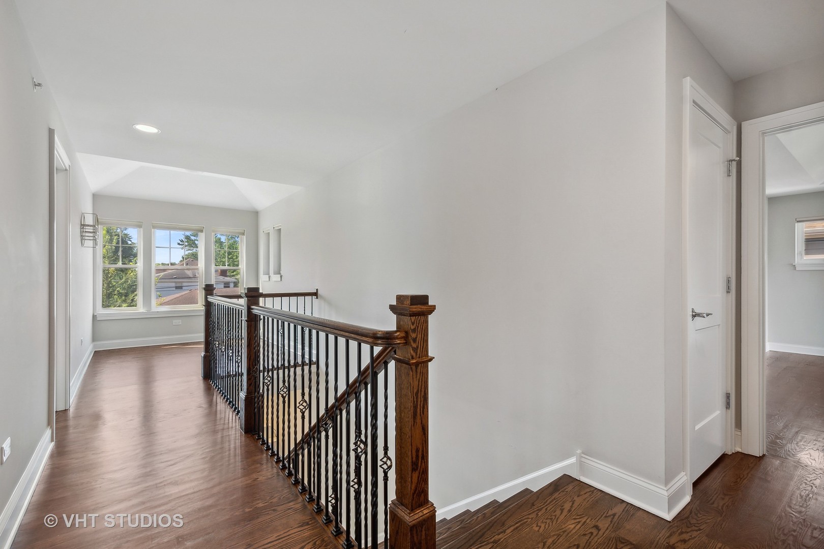 2004 West Sibley Street Park Ridge, IL 60068 - Photo 12 of 40 a view of a hallway with wooden floor and stairs