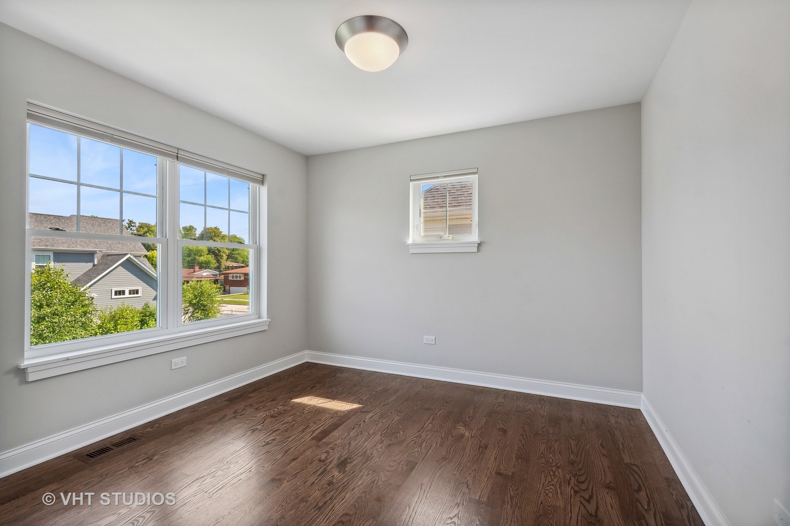 2004 West Sibley Street Park Ridge, IL 60068 - Photo 20 of 40 an empty room with wooden floor and windows