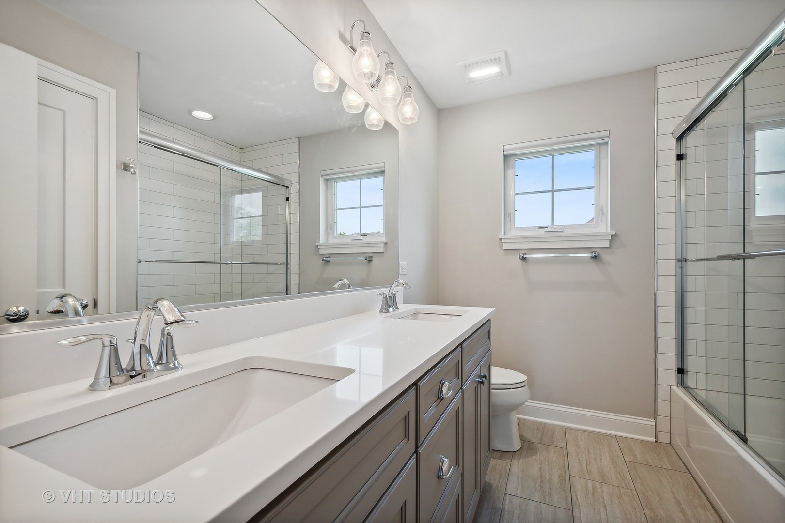 2004 West Sibley Street Park Ridge, IL 60068 - Photo 23 of 40 a bathroom with a sink a toilet a shower and a mirror