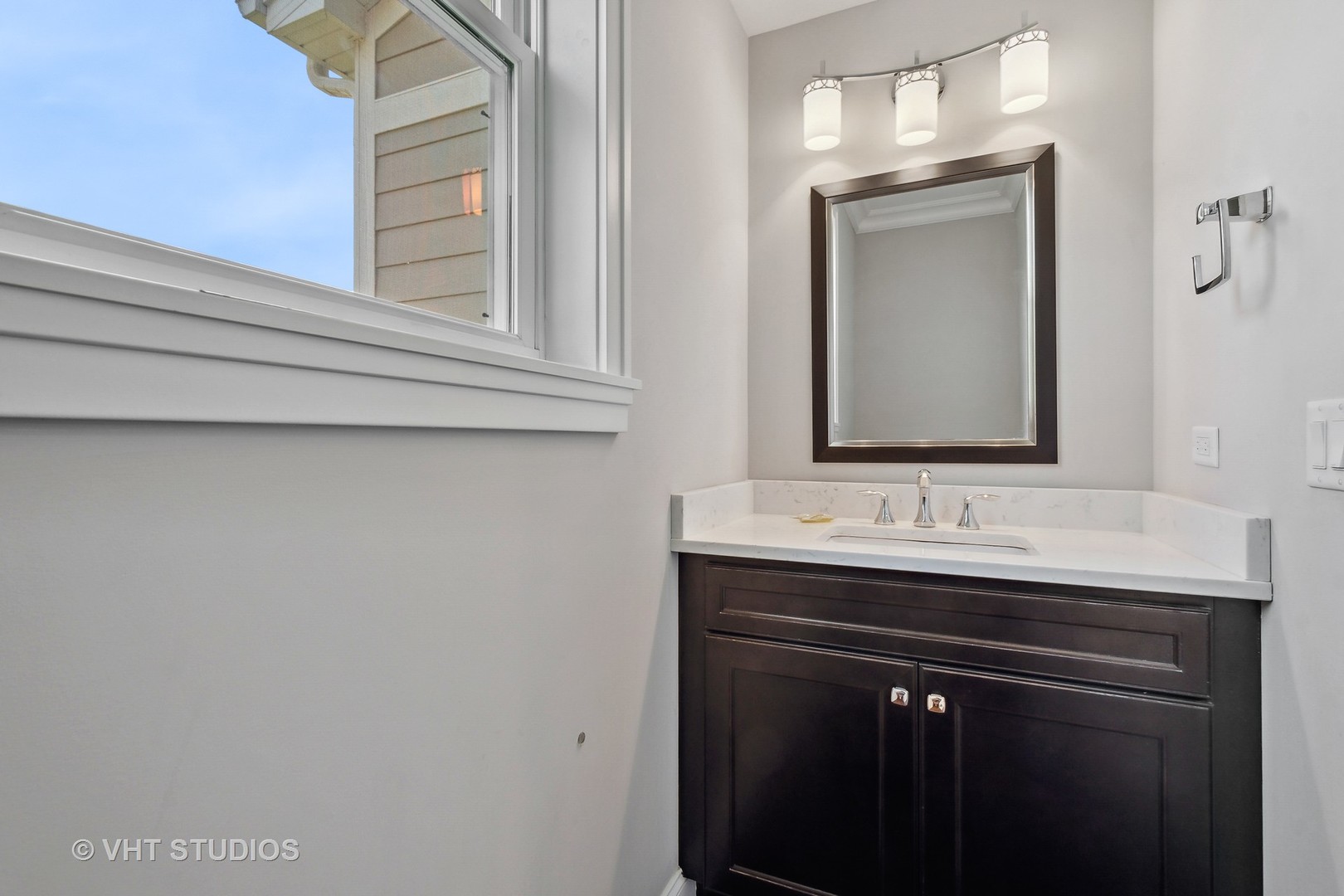 2004 West Sibley Street Park Ridge, IL 60068 - Photo 30 of 40 a bathroom with a sink and a mirror