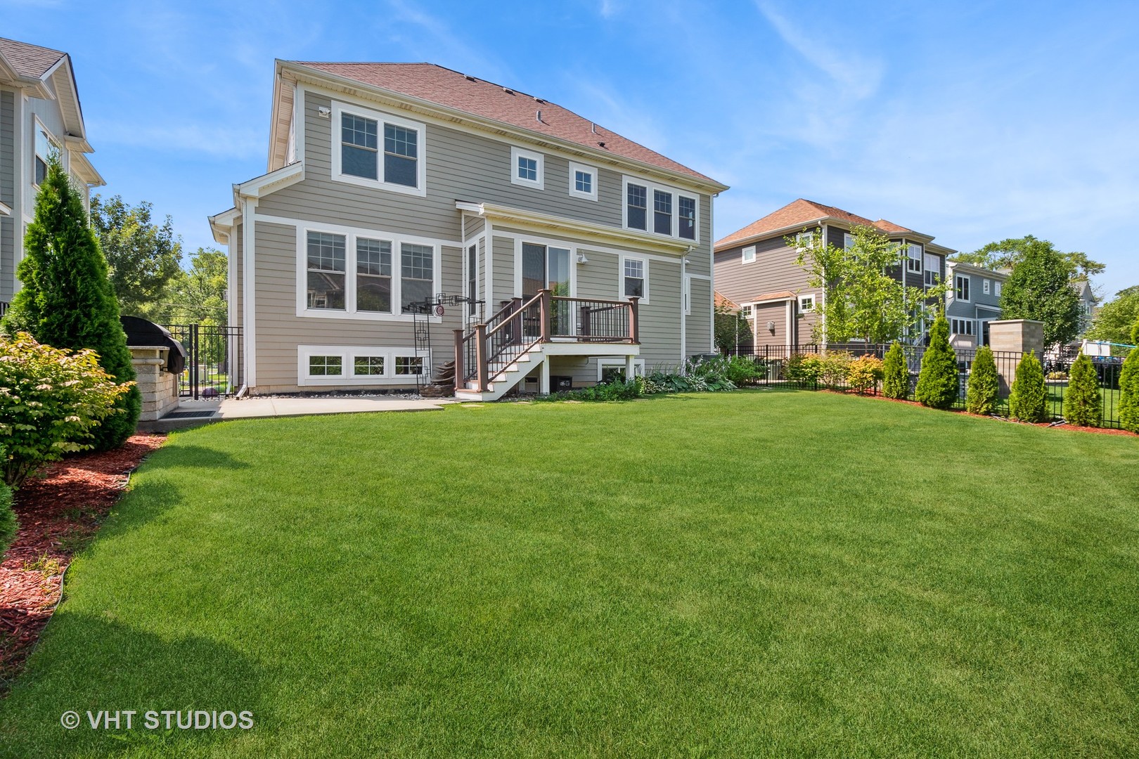 2004 West Sibley Street Park Ridge, IL 60068 - Photo 33 of 40 a front view of a house with a yard table and chairs