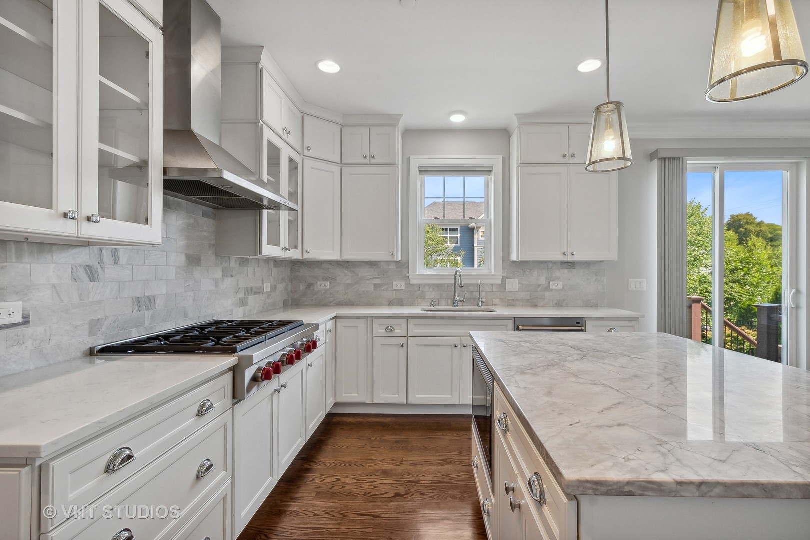 2004 West Sibley Street Park Ridge, IL 60068 - Photo 8 of 40 a kitchen with stainless steel appliances granite countertop a sink a stove and cabinets