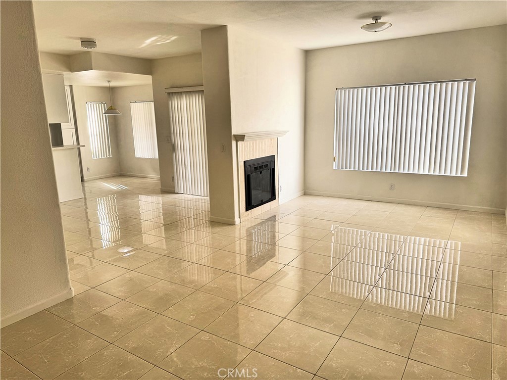 18319 Hart Street, Unit 3 Reseda, CA 91335 - Photo 2 of 18 a view of a livingroom with a fireplace