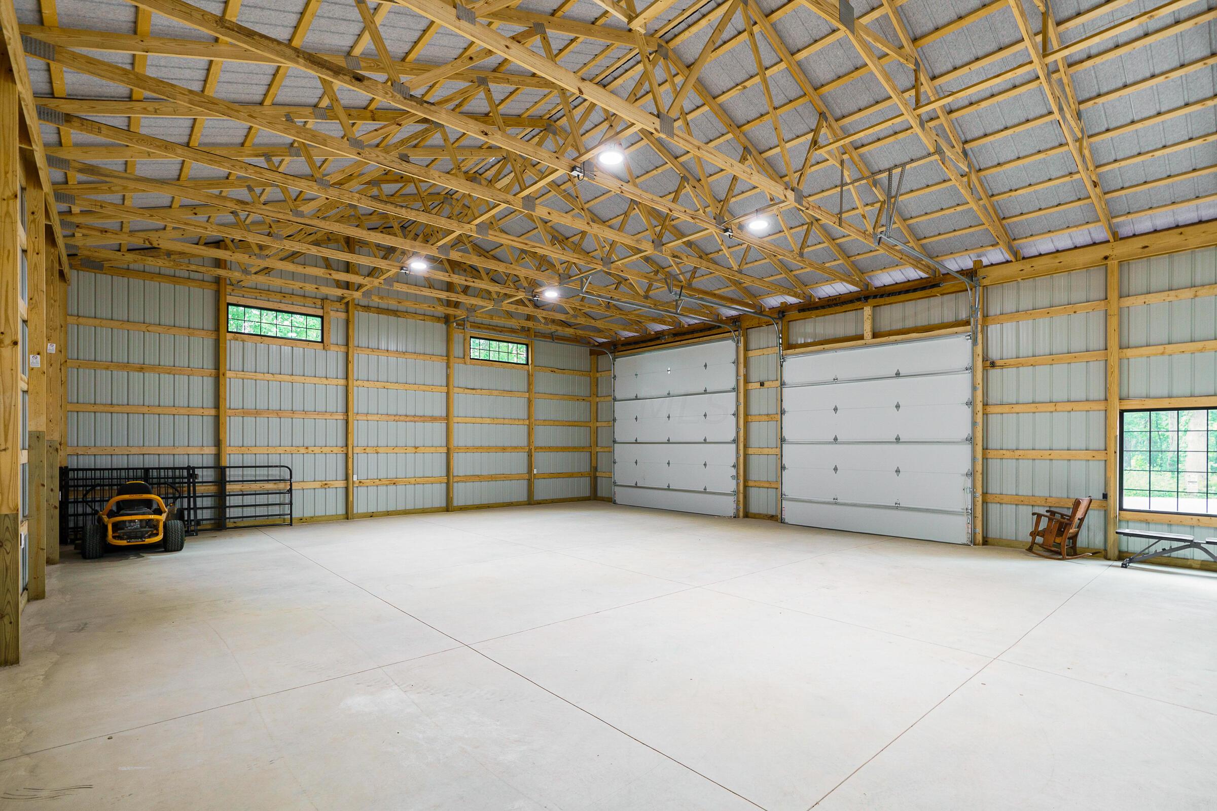 701 Ross Road Sunbury, OH 43074 - Photo 69 of 74 The bay doors offer easy parking for your BIG toys, RV or other Equipment