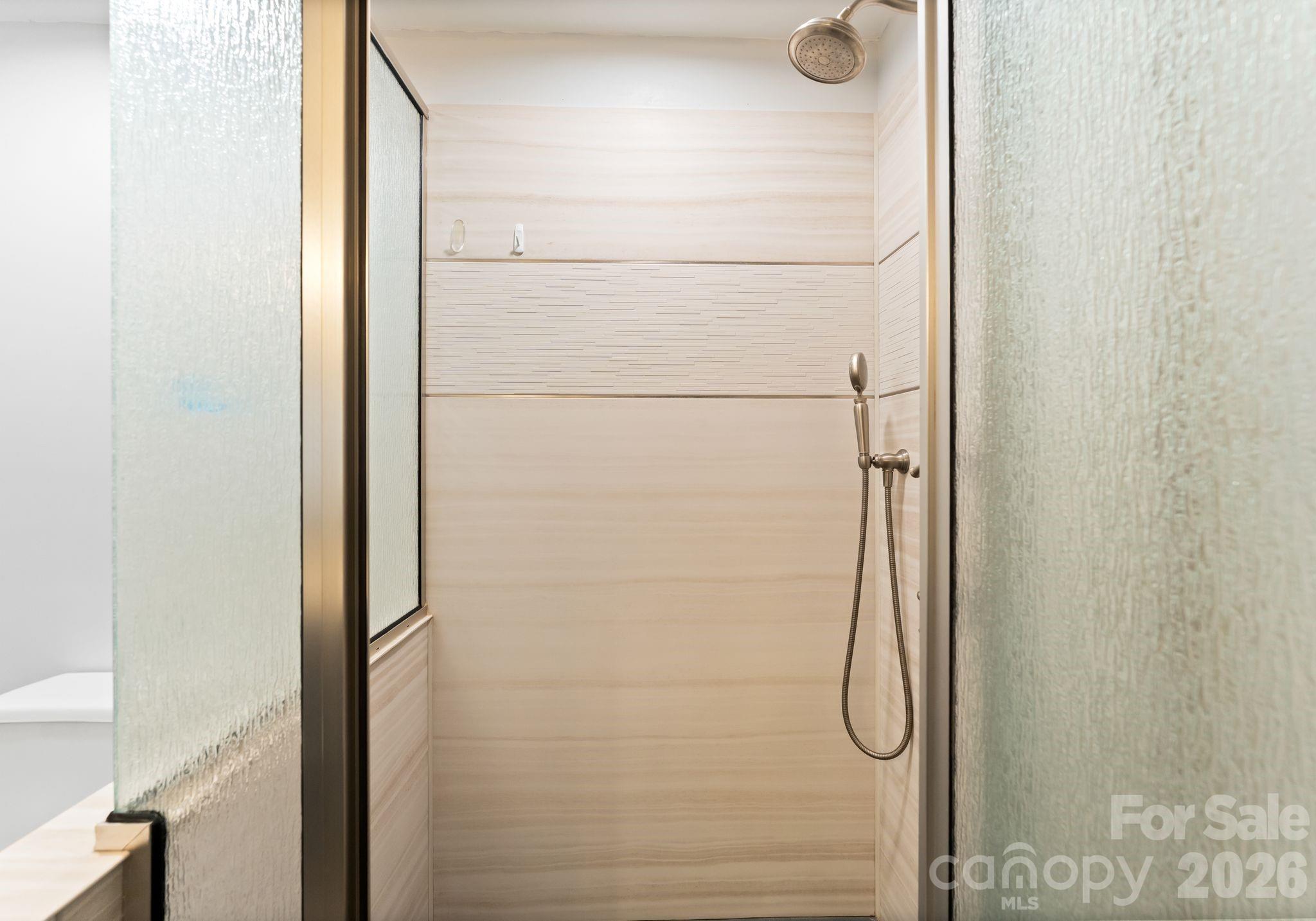 150 Barber Lyerly Road Salisbury, NC 28147 - Photo 20 of 43 a bathroom with a glass shower door