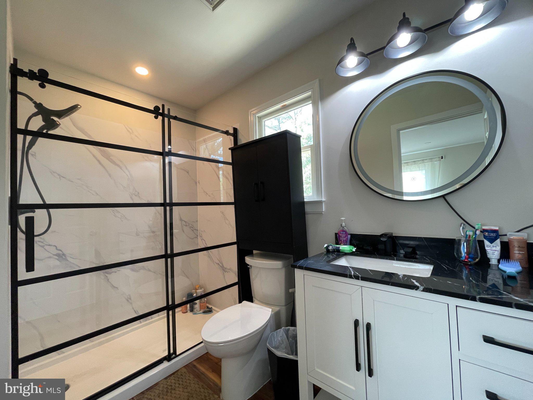 8841 Broomes Island Road Broomes Island, MD 20615 - Photo 13 of 20 Modern bathroom with sleek design.
