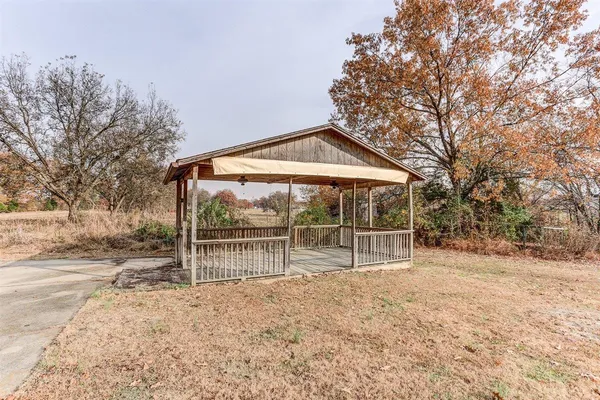 a house with trees in front of it