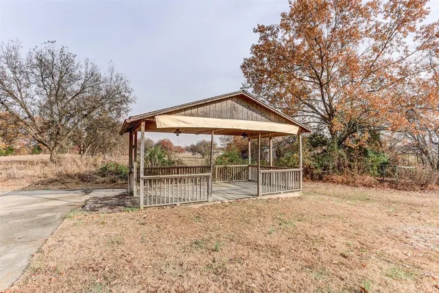 a house with trees in front of it