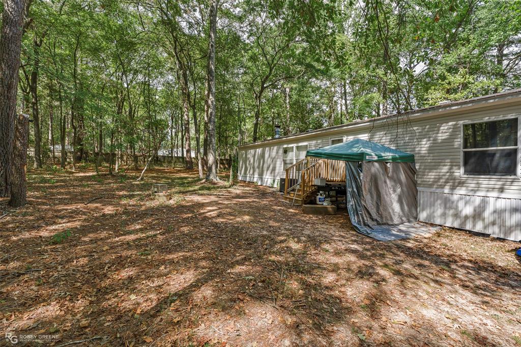 8273 Godfrey Road Shreveport, LA 71129 - Photo 25 of 27 Wooded property with mature trees