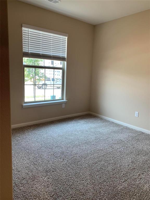 263 Honeysuckle Princeton, TX 75407 - Photo 7 of 10 an empty room with a window
