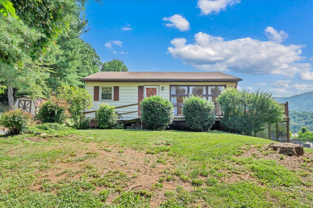 201 Long Avenue Covington, VA 24426 - Photo 3 of 43 a house view with a garden space