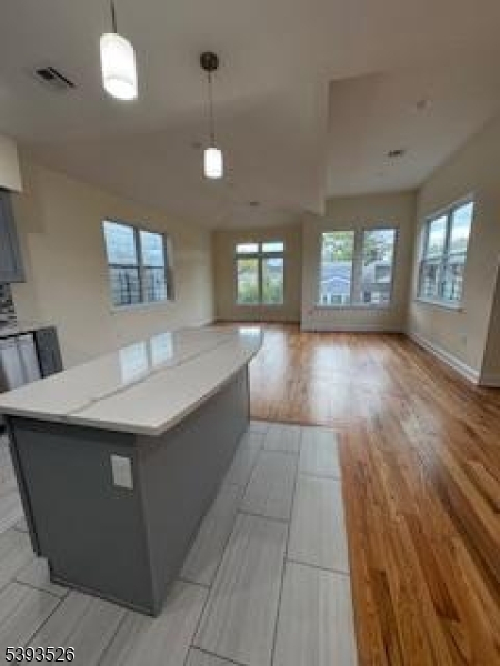38 Blum Street Newark, NJ 07103 - Photo 5 of 15 a large hall with sitting area