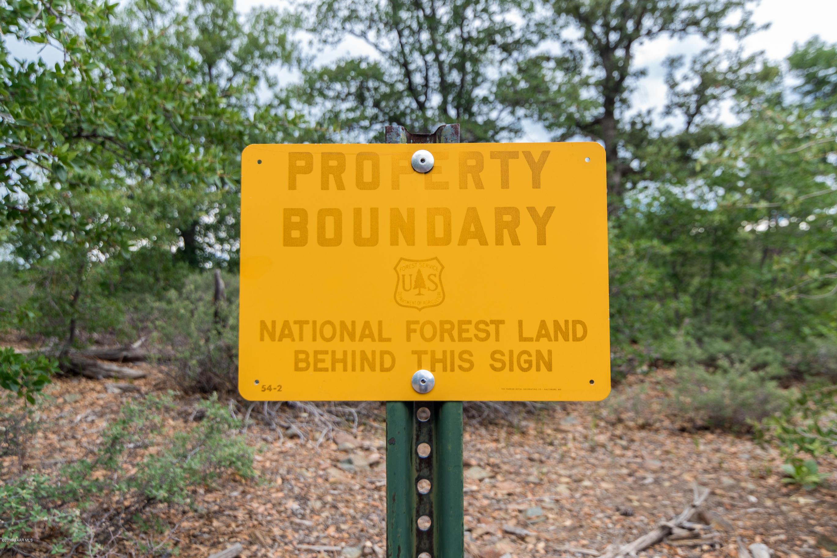 4680 South Stoney Ridge Road Prescott, AZ 86303 - Photo 11 of 39 a sign broad on the side of the road