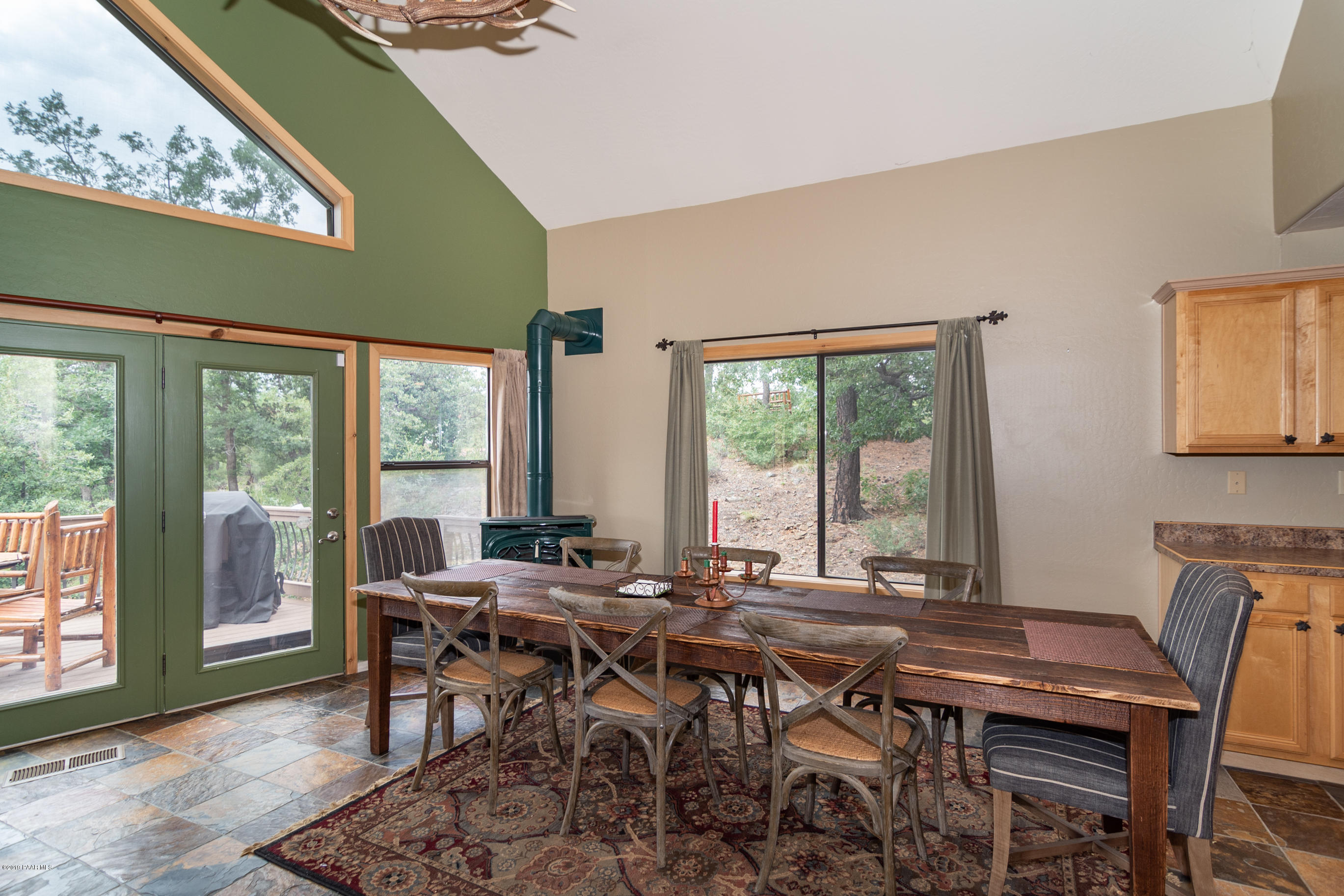 4680 South Stoney Ridge Road Prescott, AZ 86303 - Photo 20 of 39 a view of a dining room with furniture window and outside view
