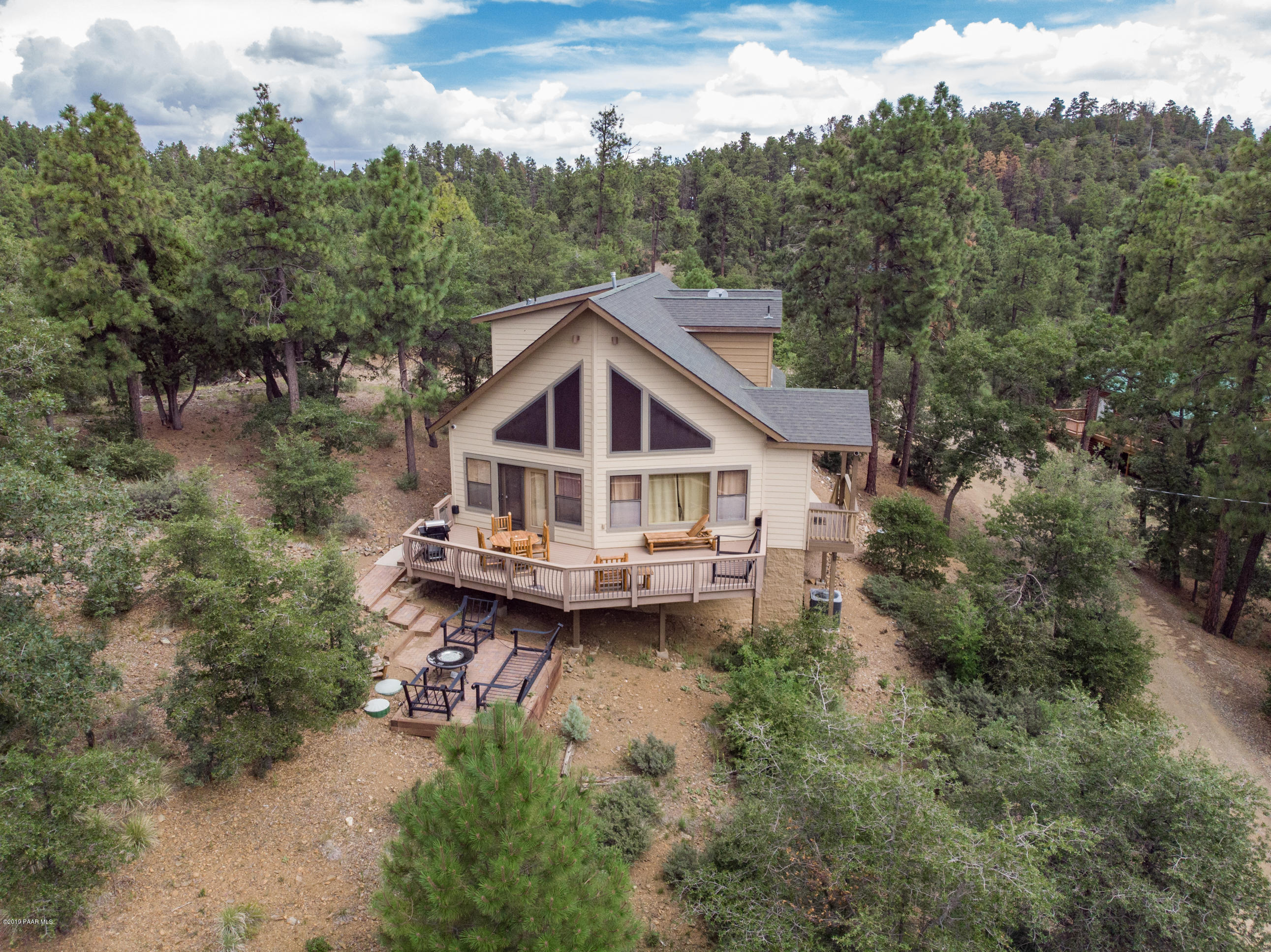 4680 South Stoney Ridge Road Prescott, AZ 86303 - Photo 2 of 39 a view of a house with roof deck