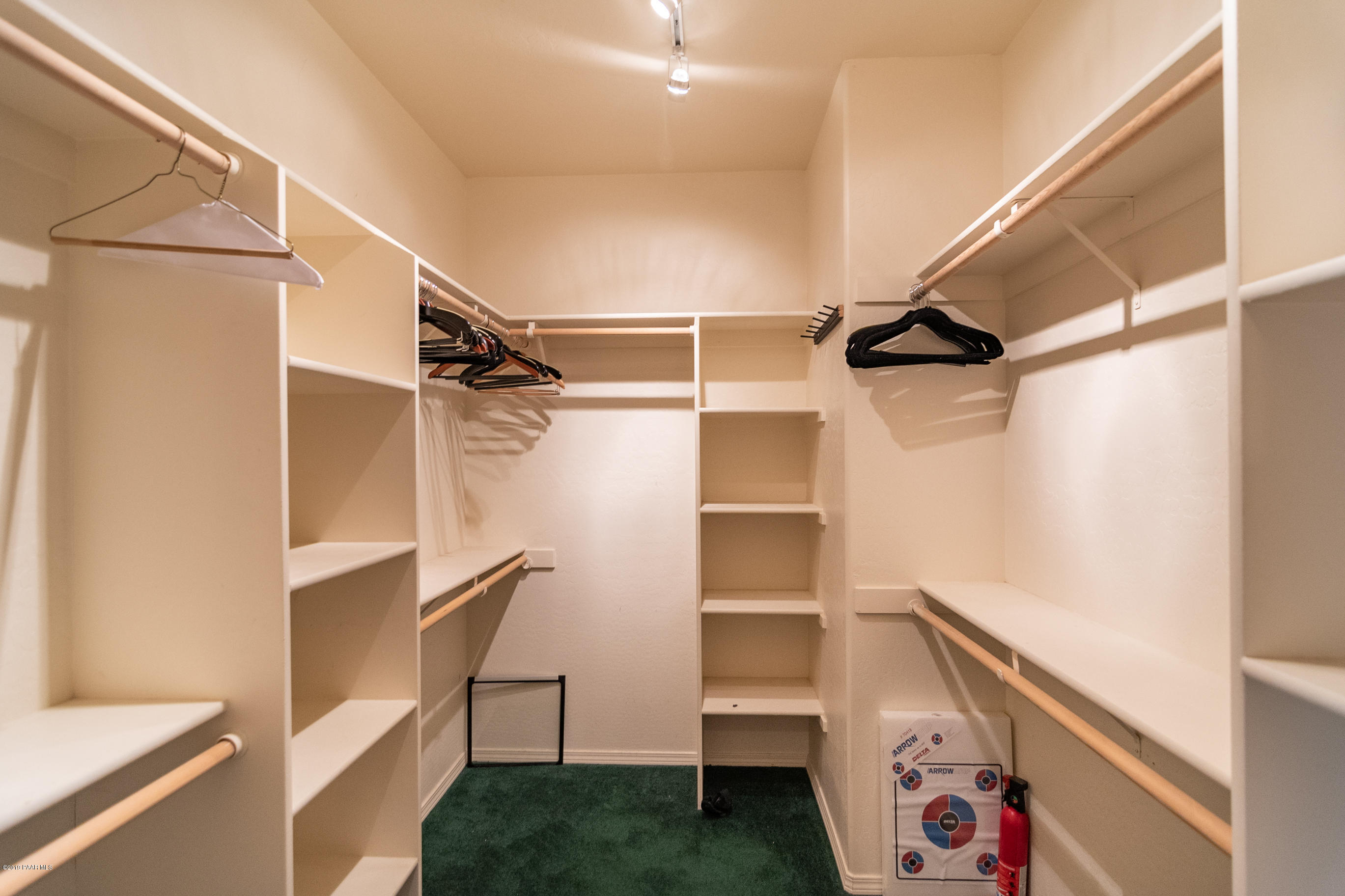 4680 South Stoney Ridge Road Prescott, AZ 86303 - Photo 31 of 39 a view of walk in closet with empty racks