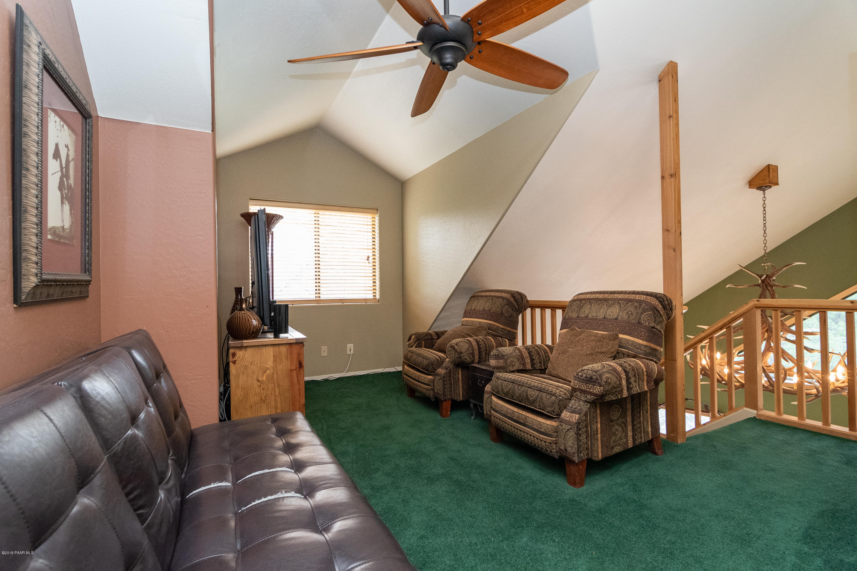 4680 South Stoney Ridge Road Prescott, AZ 86303 - Photo 32 of 39 a living room with furniture and a large window