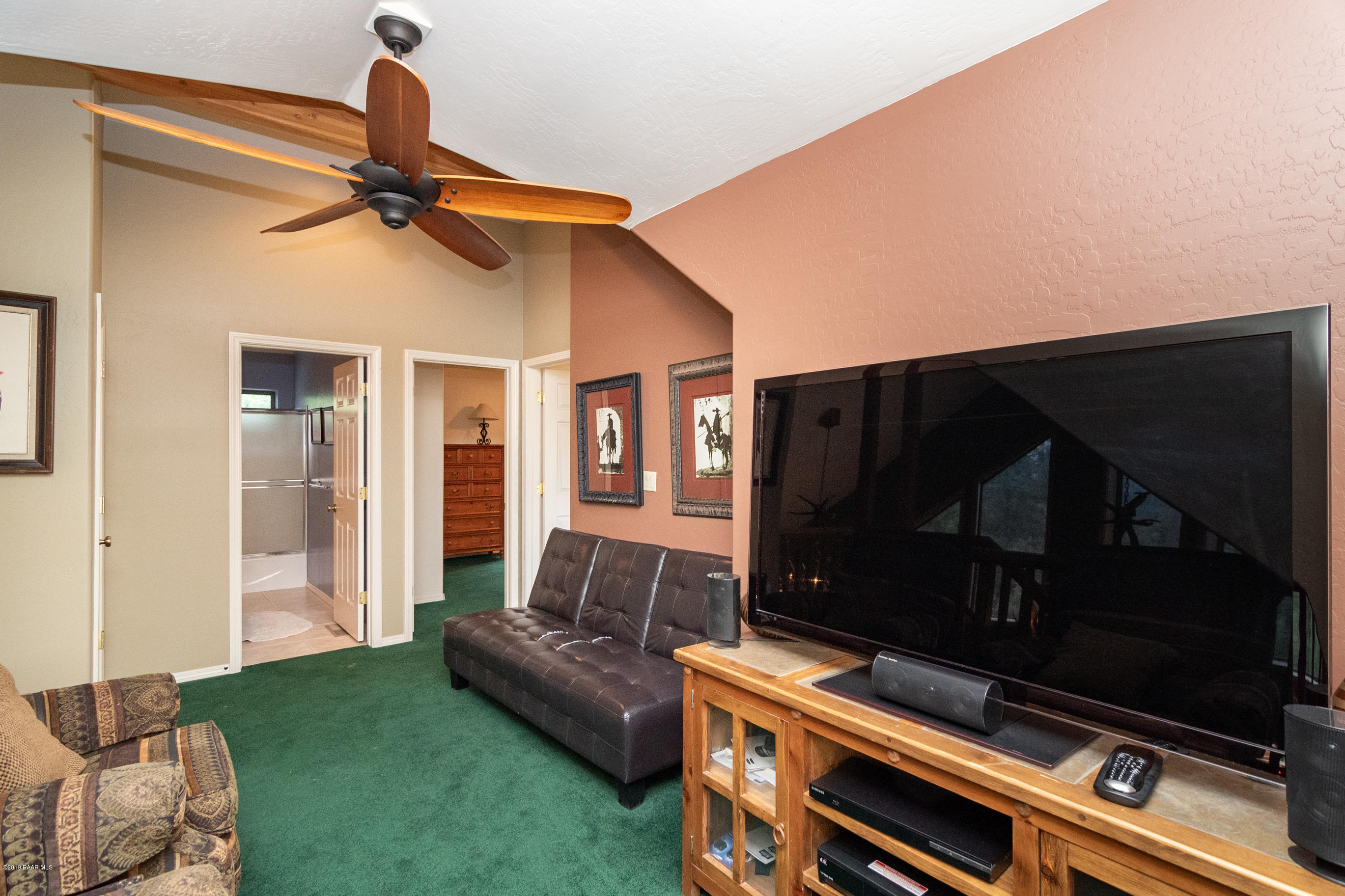 4680 South Stoney Ridge Road Prescott, AZ 86303 - Photo 34 of 39 a living room with furniture and a flat screen tv