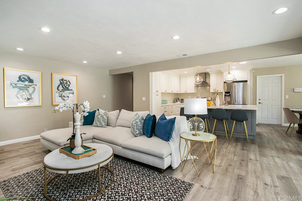 3839 Castle Rock Road Diamond Bar, CA 91765 - Photo 1 of 1 a living room with furniture and a wooden floor