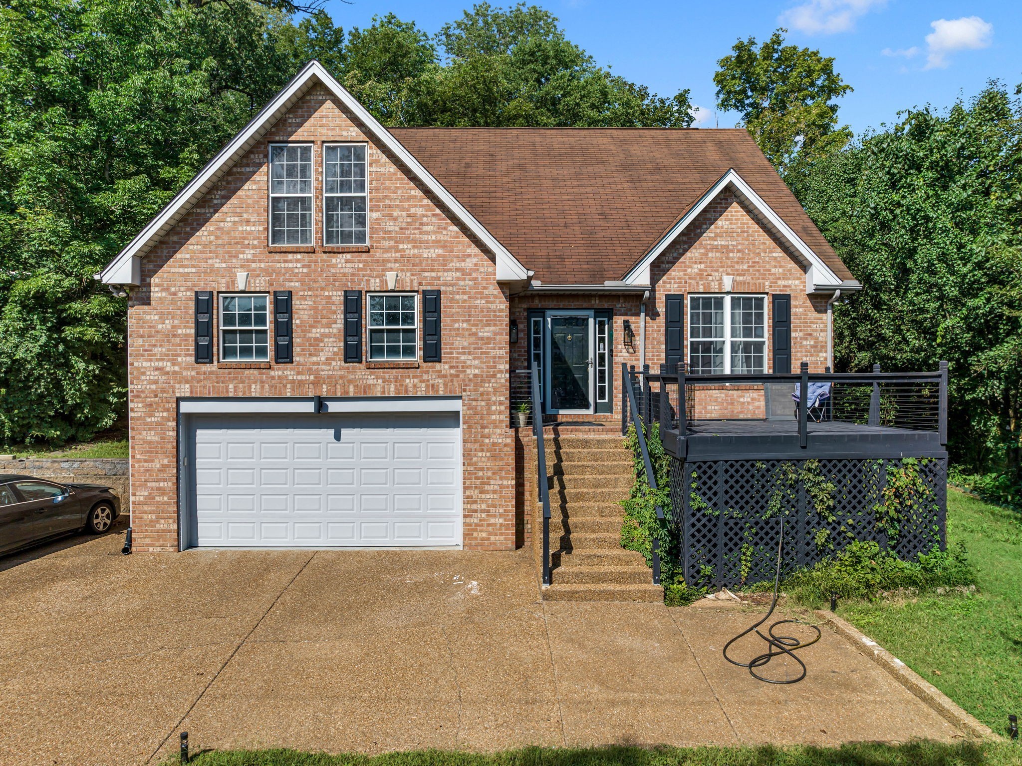 a view of house and outdoor space with yard