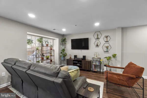 a living room with furniture and a couch