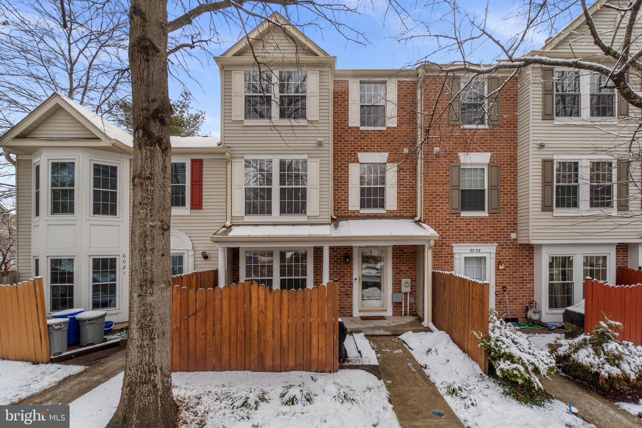 6025 Weekend Way, Unit 43 Columbia, MD 21044 - Photo 37 of 37 a front view of a house with a yard