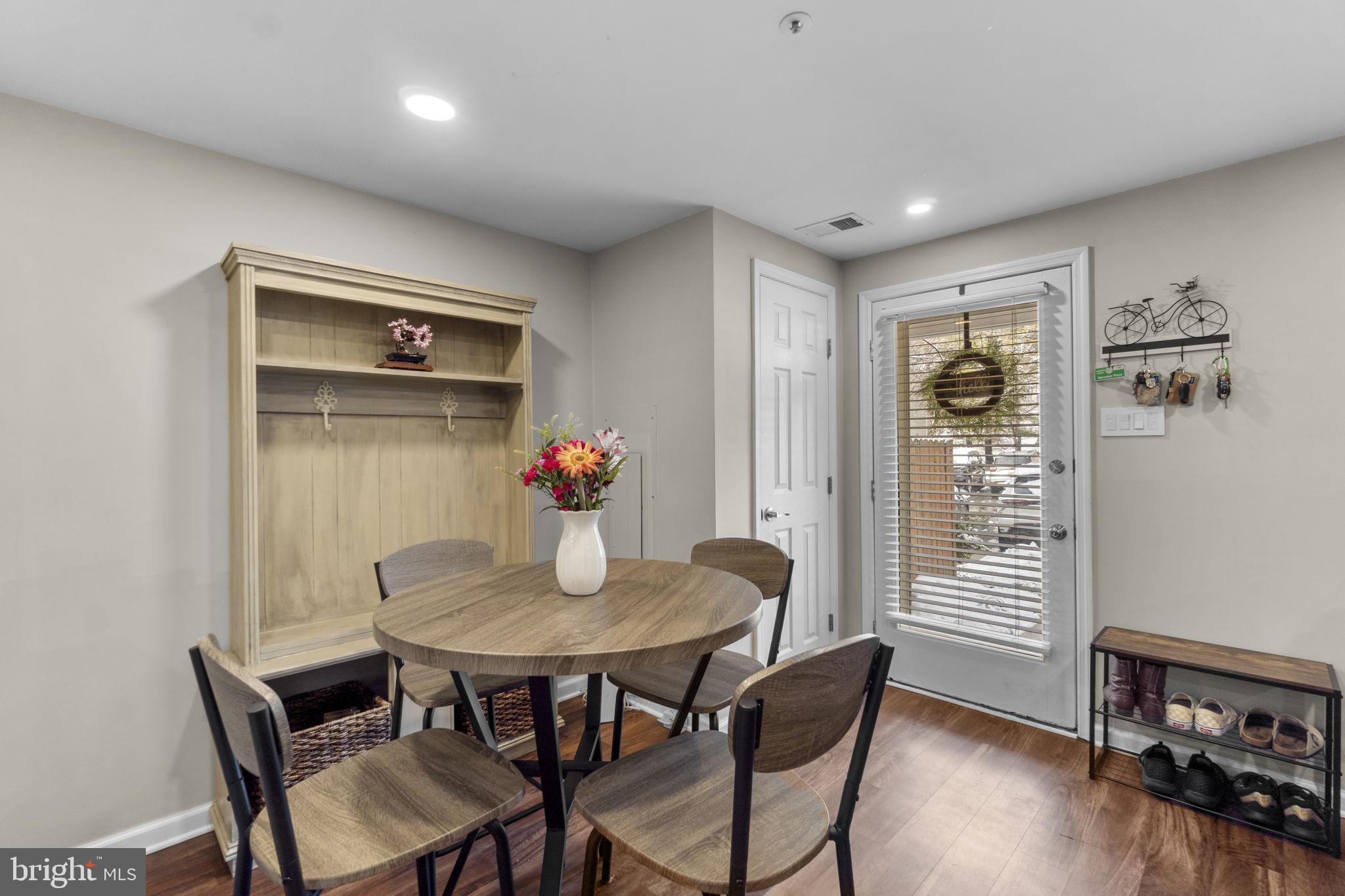 6025 Weekend Way, Unit 43 Columbia, MD 21044 - Photo 5 of 37 a dining room with furniture and window