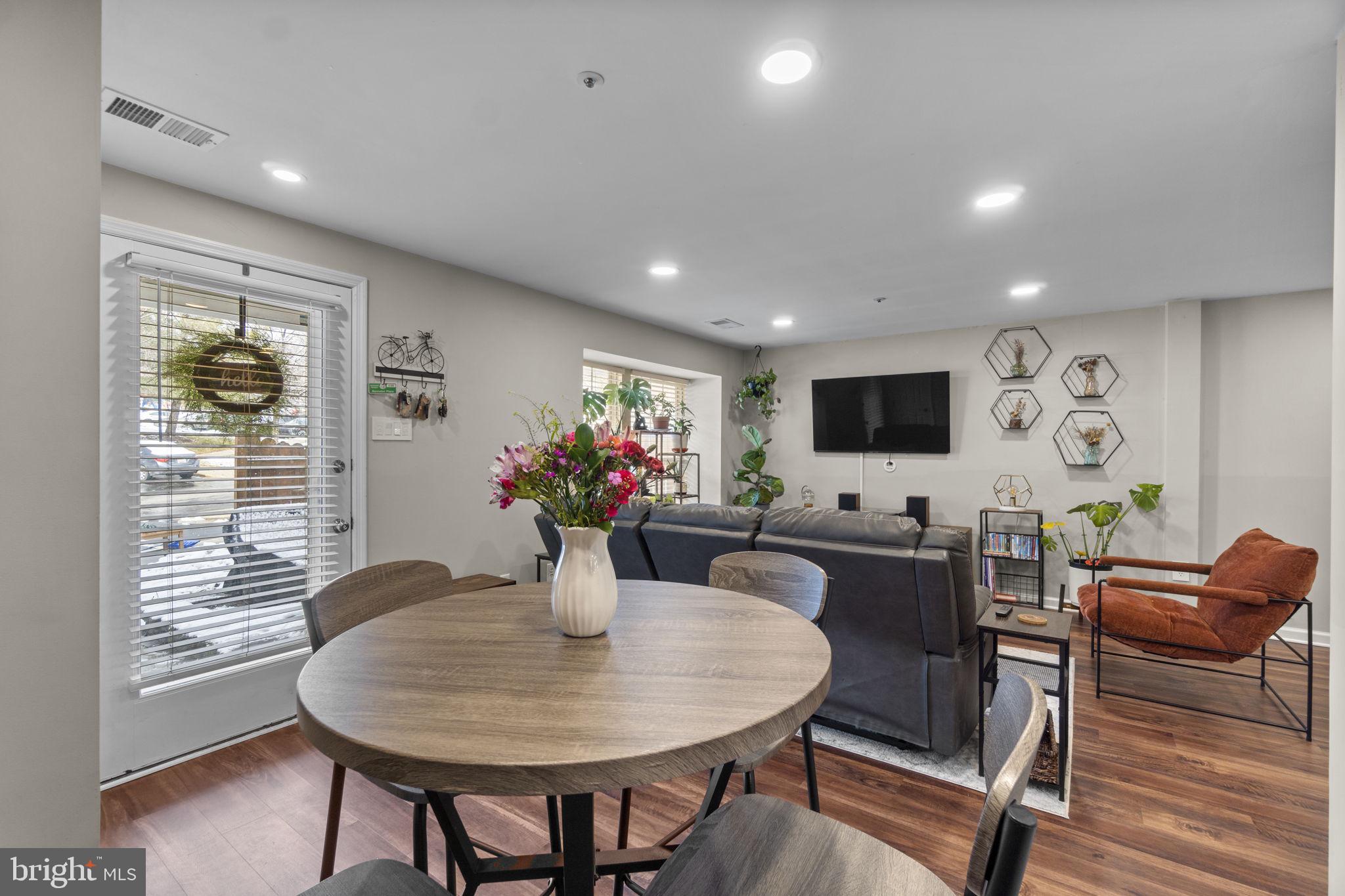 6025 Weekend Way, Unit 43 Columbia, MD 21044 - Photo 6 of 37 a dining room with furniture and window