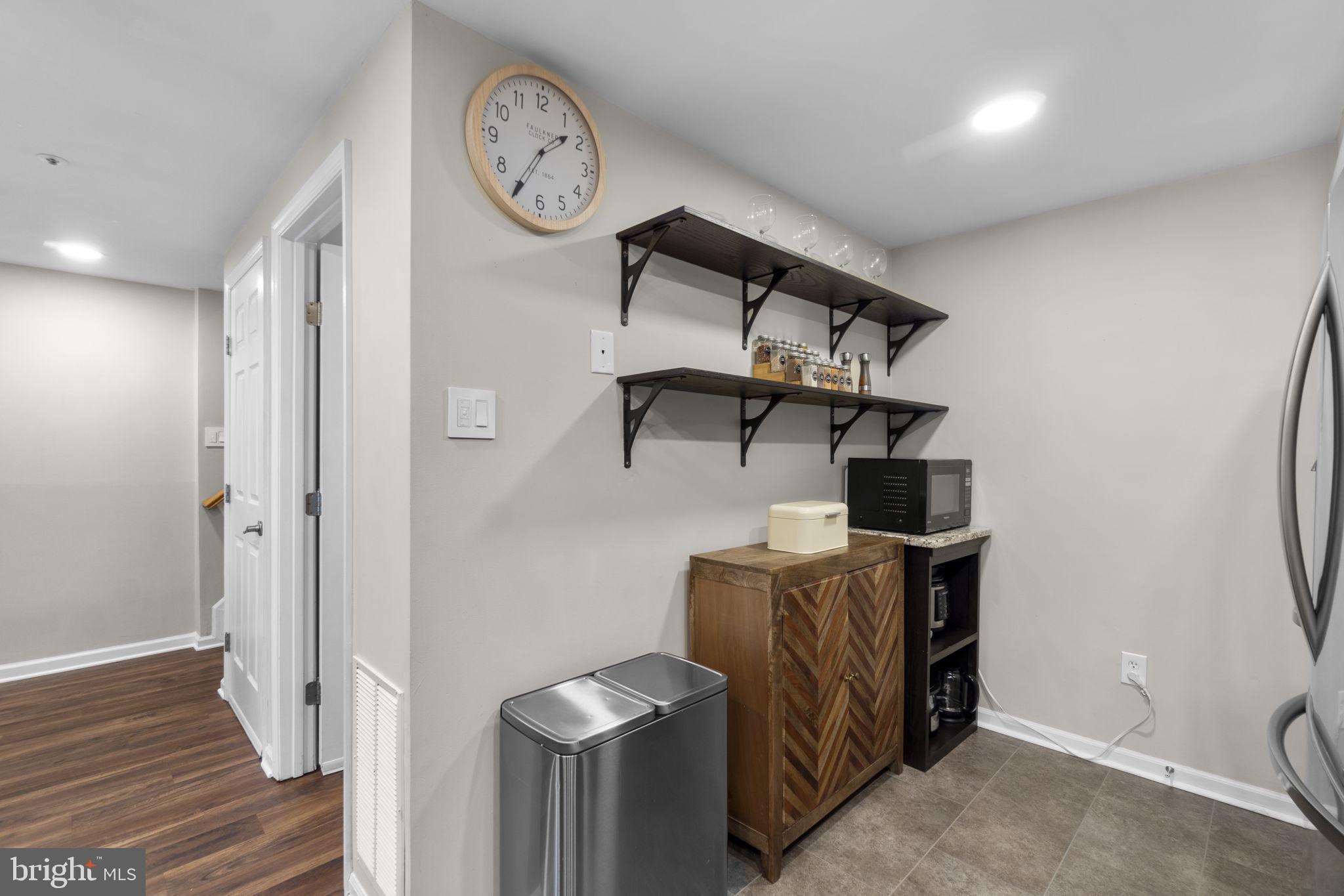 6025 Weekend Way, Unit 43 Columbia, MD 21044 - Photo 8 of 37 a view of a hallway with elevator