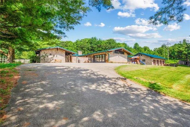 a view of a house with a big yard