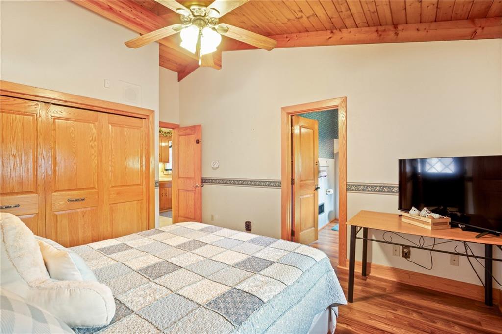 2100 Water Level Road Somerset, PA 15501 - Photo 30 of 49 a bedroom with a bed and a flat screen tv