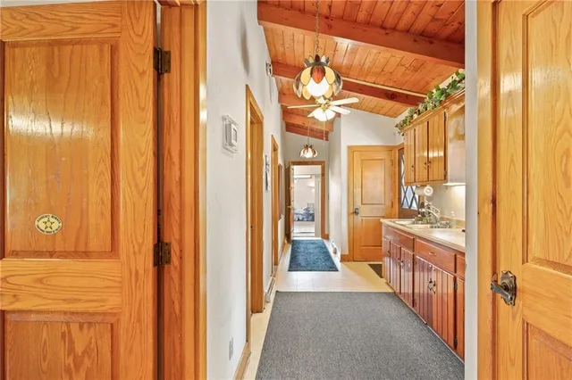 a view of a bathroom with a shower and a sink