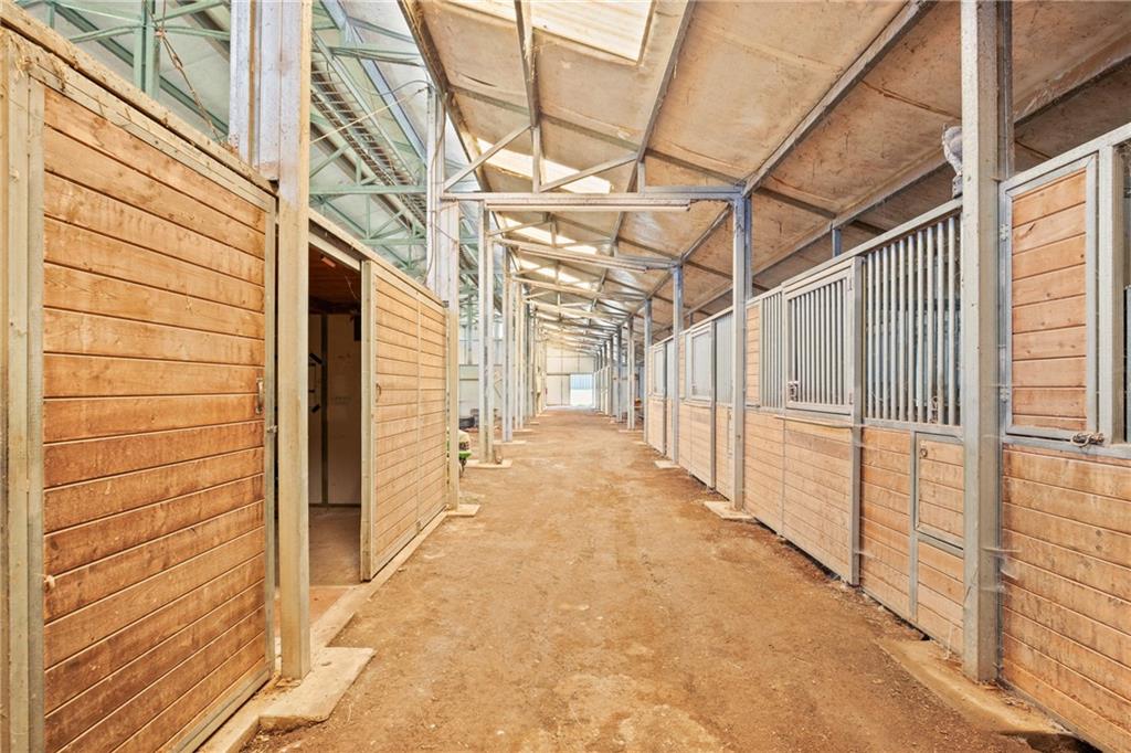 2100 Water Level Road Somerset, PA 15501 - Photo 43 of 49 a view of a porch with a wooden floor and stairs