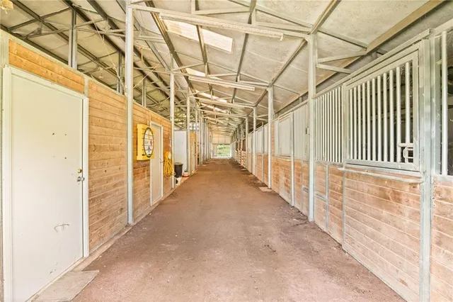 a view of a porch with wooden floor
