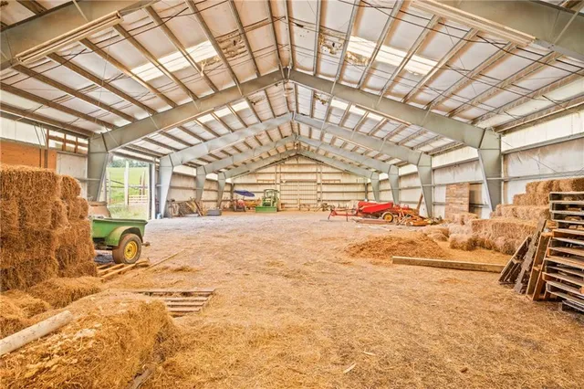 a view of a room with wooden roof