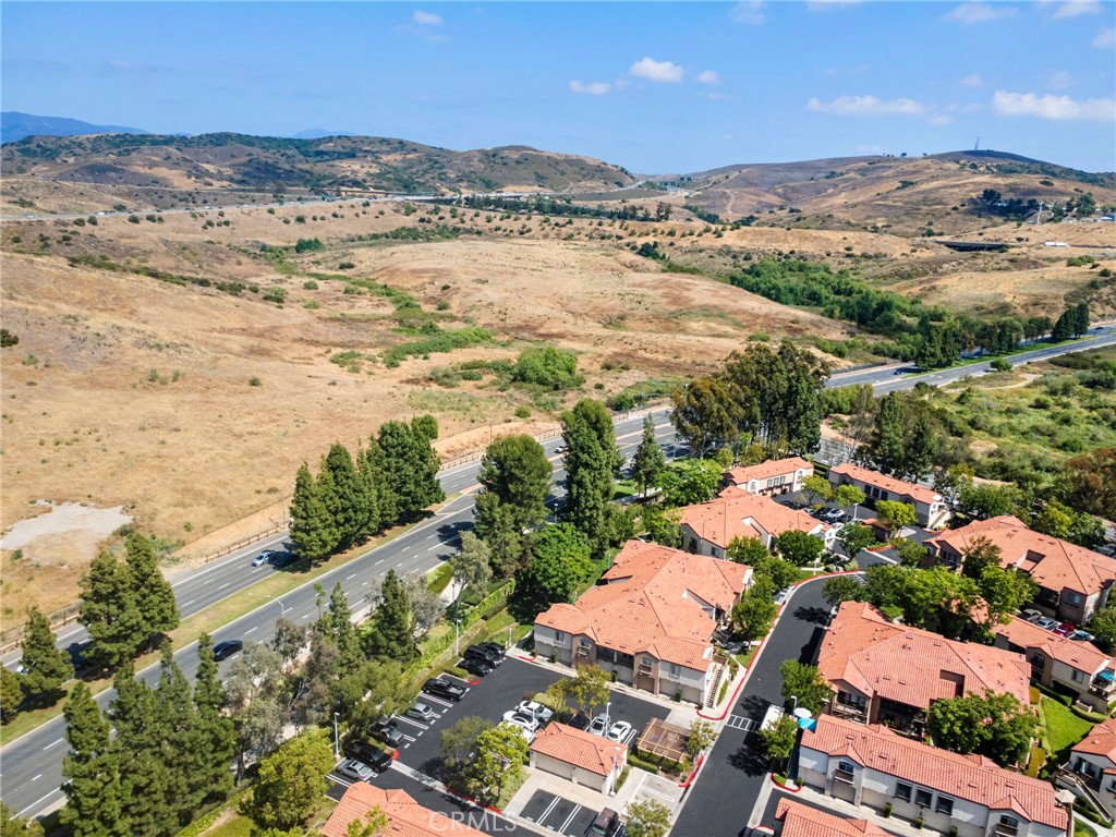 215 South Cross Creek Road, Unit L Orange, CA 92869 - Photo 46 of 50 an aerial view of residential houses with outdoor space