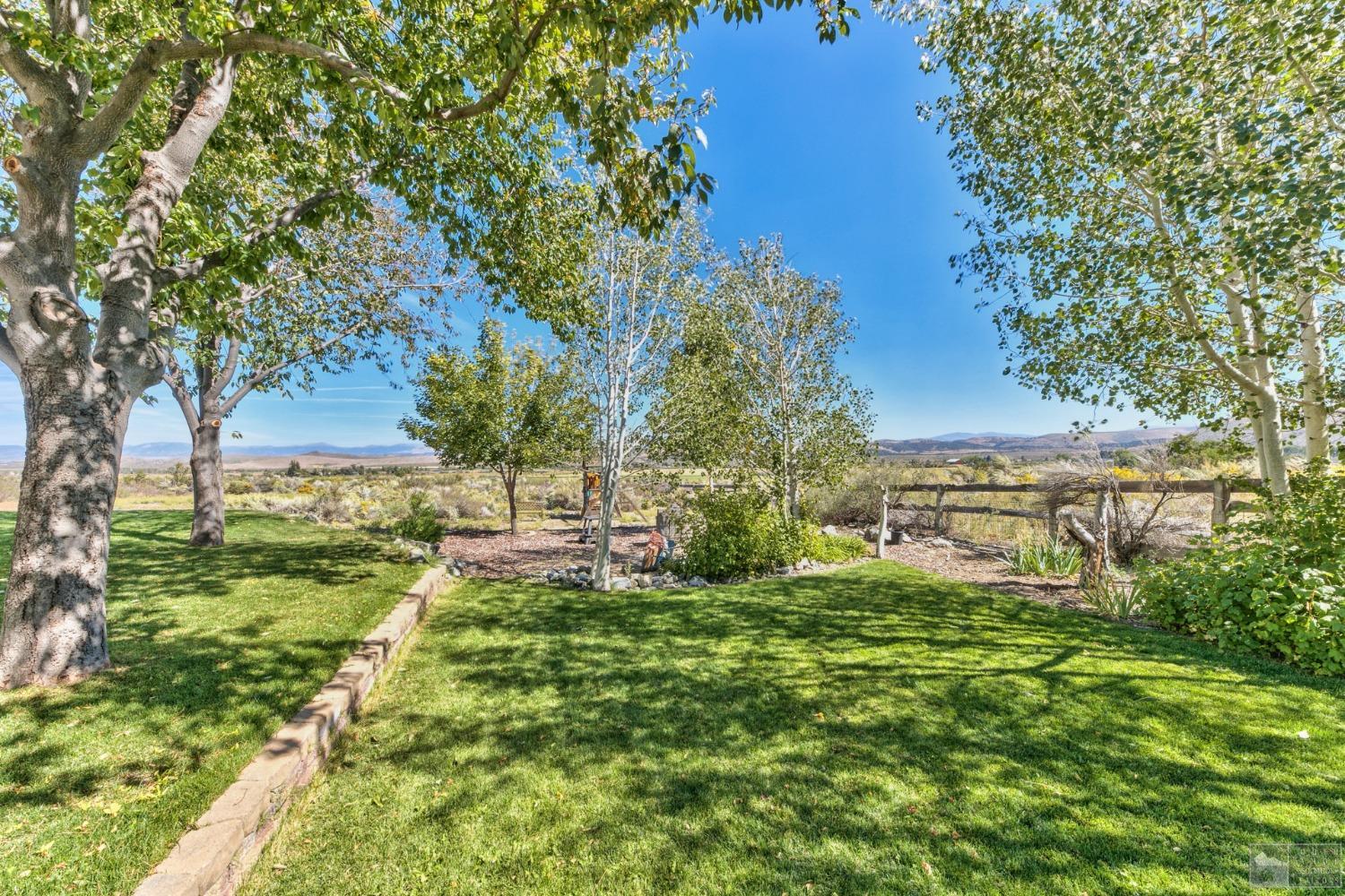 1111 Foothill Road Markleeville, CA 96120 - Photo 13 of 28 a view of a garden with large trees