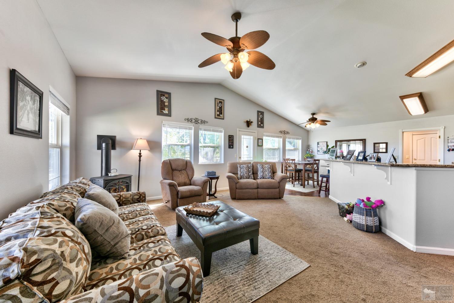 1111 Foothill Road Markleeville, CA 96120 - Photo 16 of 28 a living room with furniture and a large window
