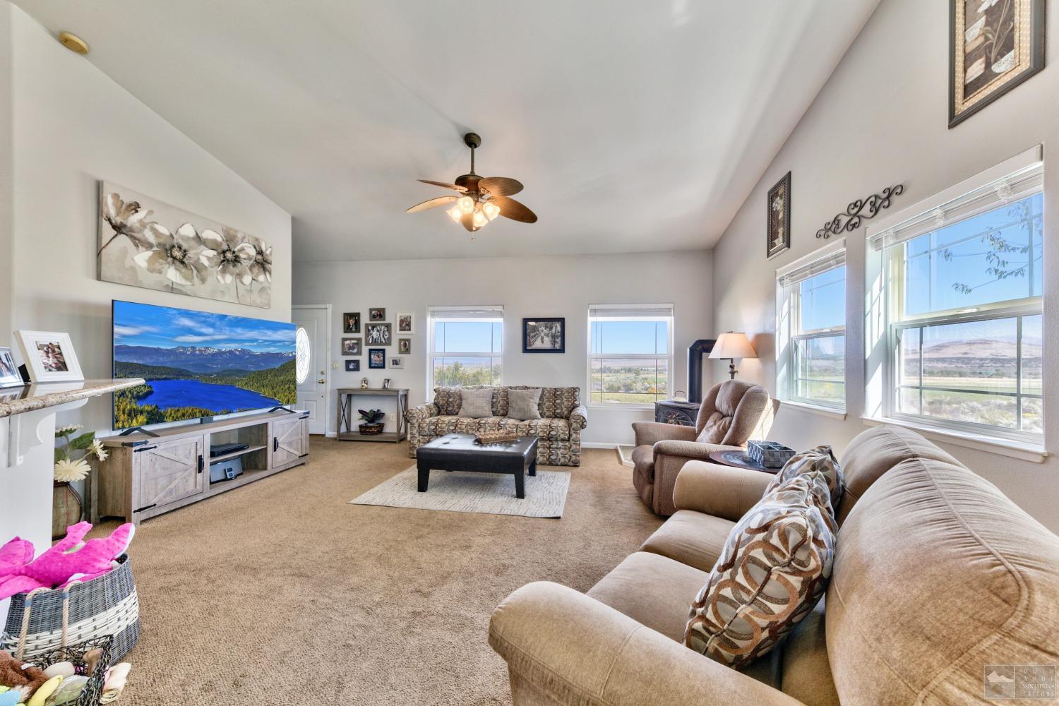 1111 Foothill Road Markleeville, CA 96120 - Photo 18 of 28 a living room with furniture and a flat screen tv
