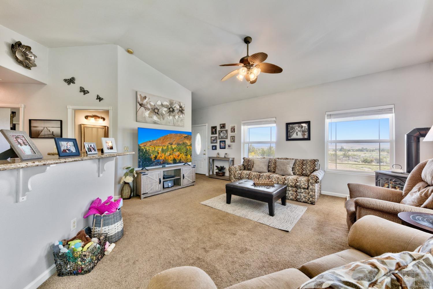 1111 Foothill Road Markleeville, CA 96120 - Photo 19 of 28 a living room with furniture and a flat screen tv
