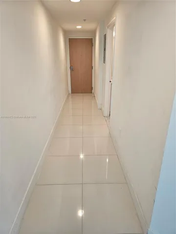 a view of hallway with white walls