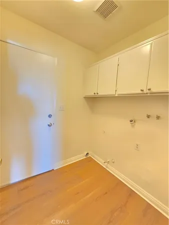 a view of a room with an empty space