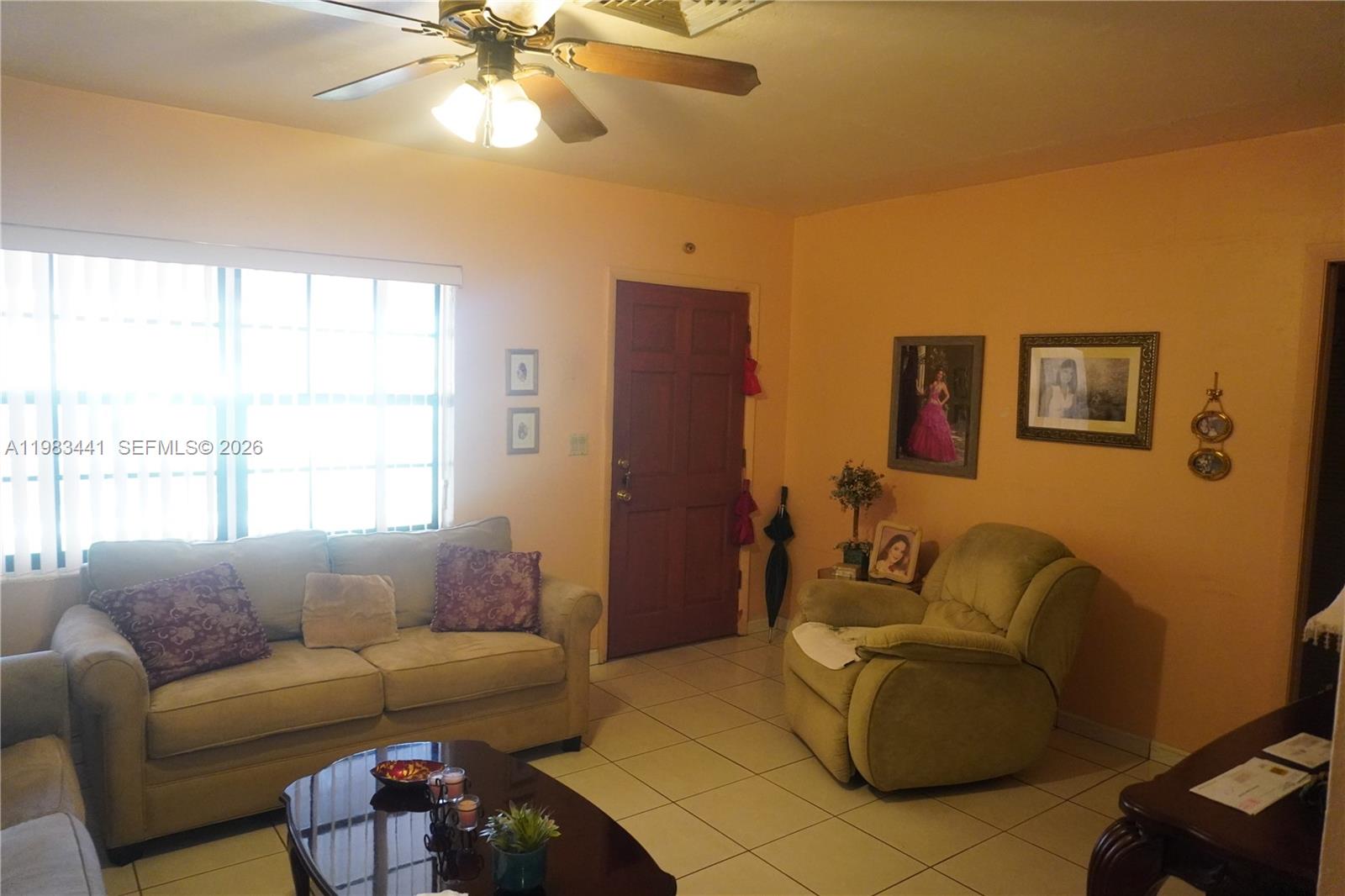 2660 Southwest 36th Avenue Miami, FL 33133 - Photo 12 of 32 a living room with furniture and a large window