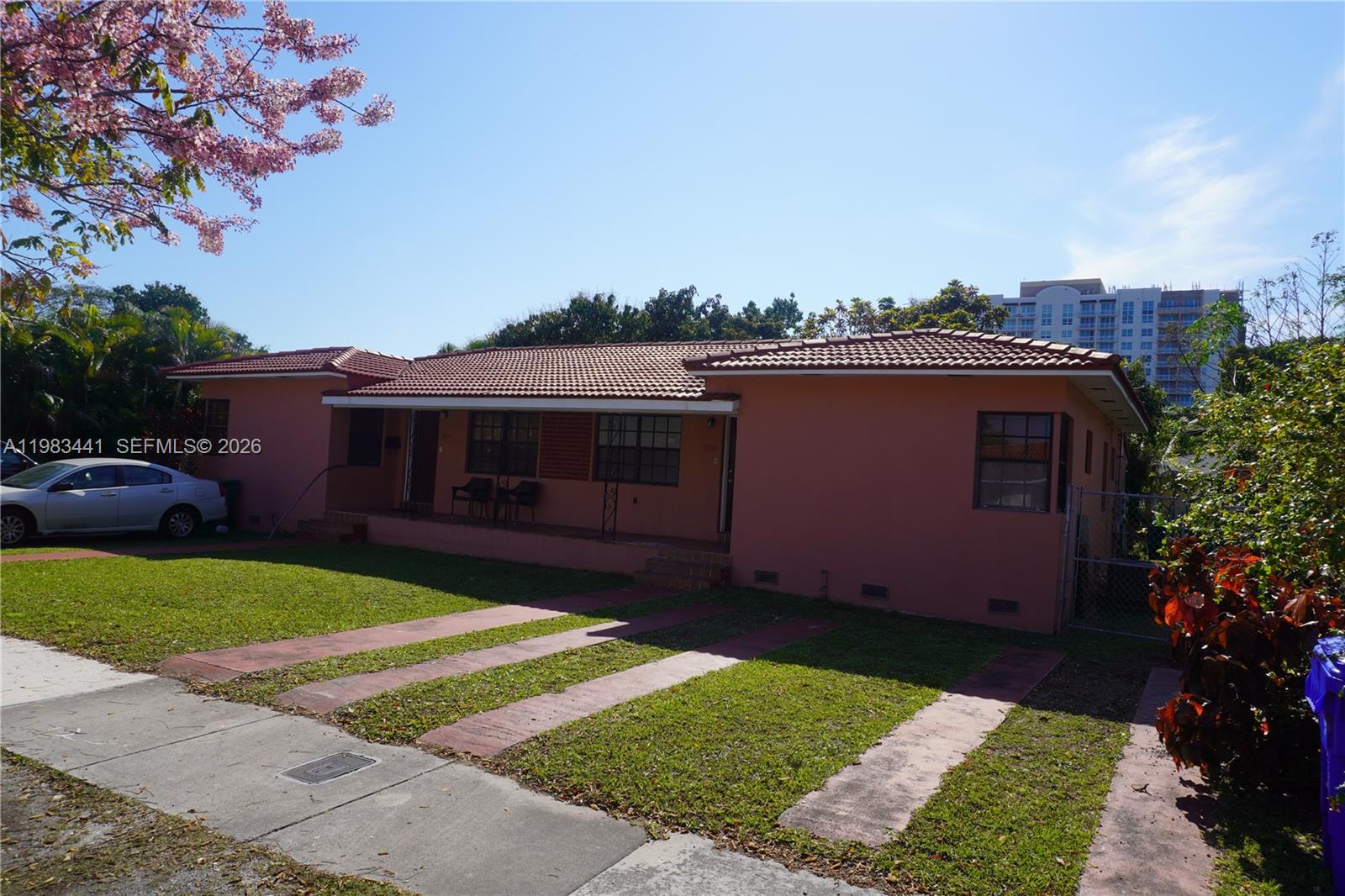 2660 Southwest 36th Avenue Miami, FL 33133 - Photo 2 of 32 a view of a house with a yard