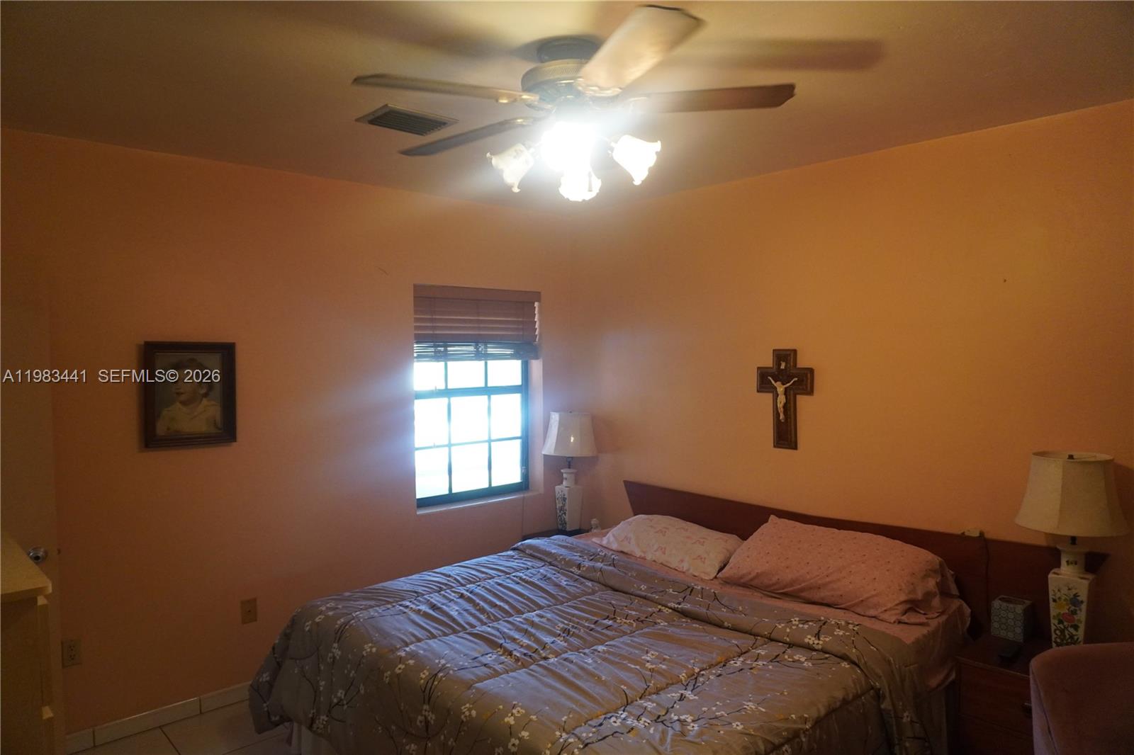 2660 Southwest 36th Avenue Miami, FL 33133 - Photo 21 of 32 a bedroom with a bed and a window