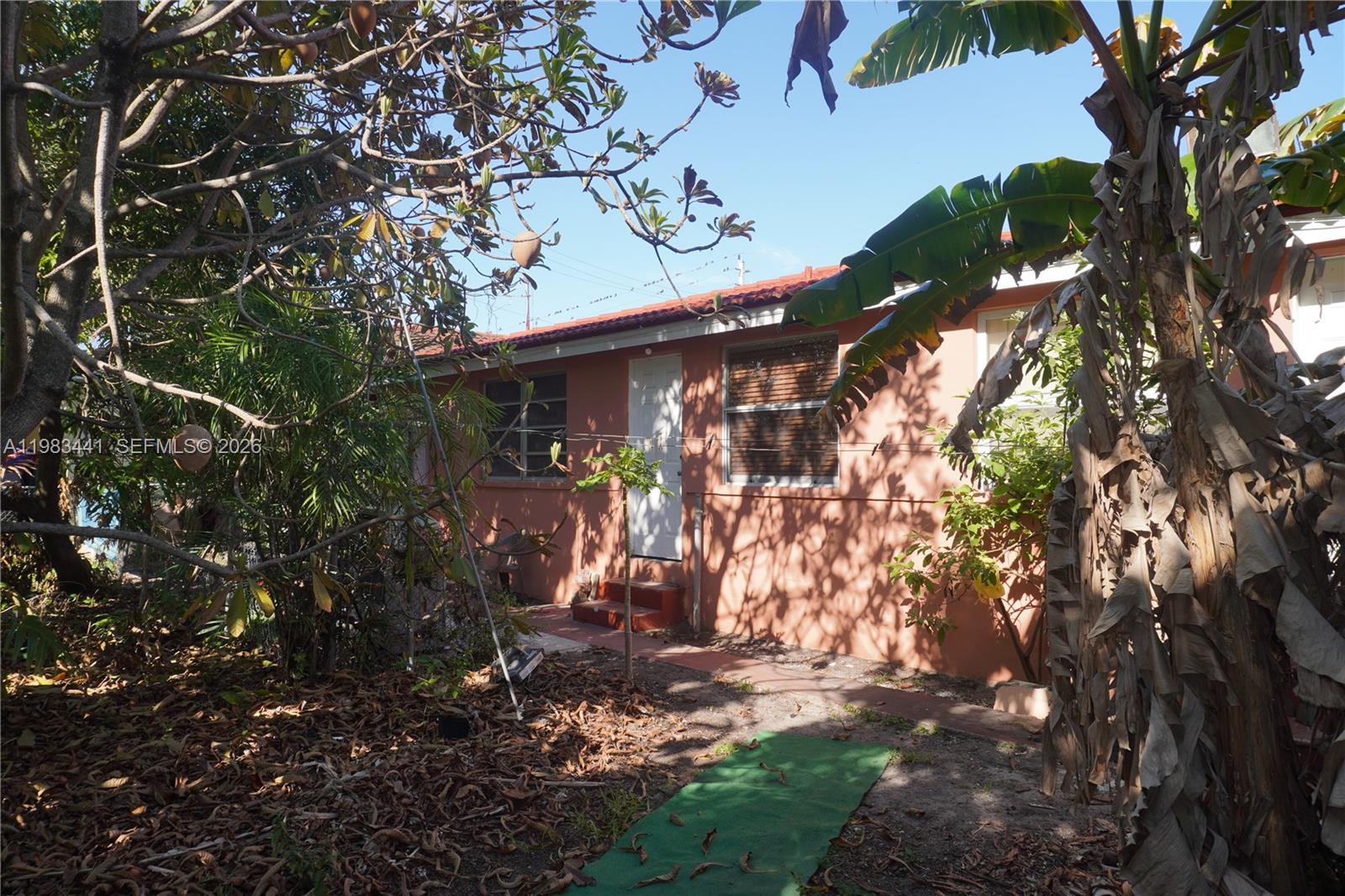 2660 Southwest 36th Avenue Miami, FL 33133 - Photo 29 of 32 a view of a house with a tree