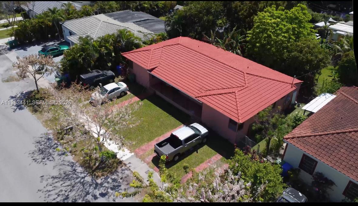 2660 Southwest 36th Avenue Miami, FL 33133 - Photo 30 of 32 an aerial view of a house with a yard